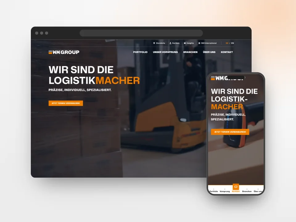 MacBook mit der Startseite der WM GROUP und der Headline „Wir sind die Logistikmacher“