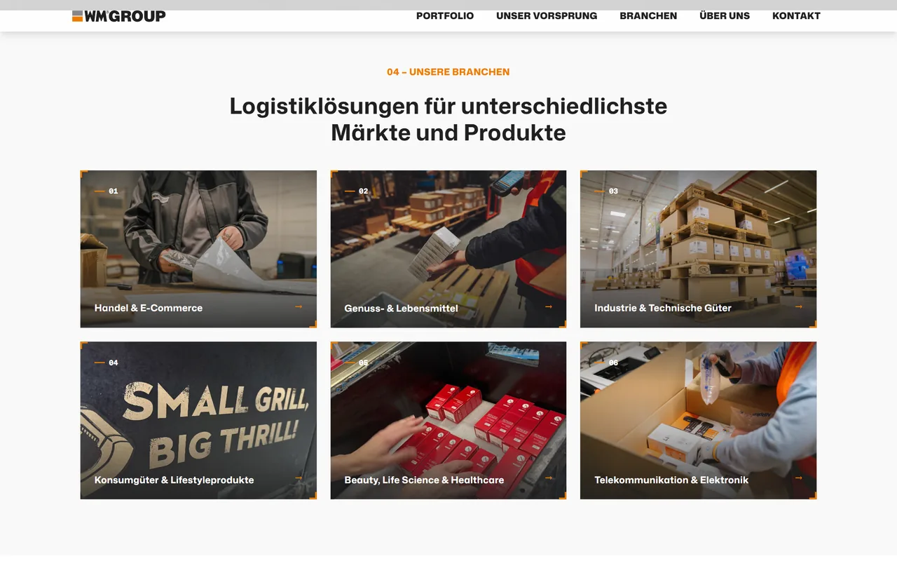WM-GROUP-Website am Desktop: Bereich „Unsere Branchen“ mit sechs Bildkacheln von Handel und E-Commerce bis Telekommunikation und Elektronik